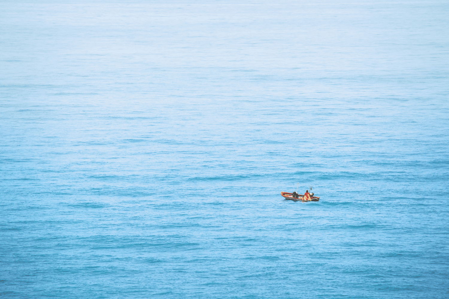 small boat in ocean