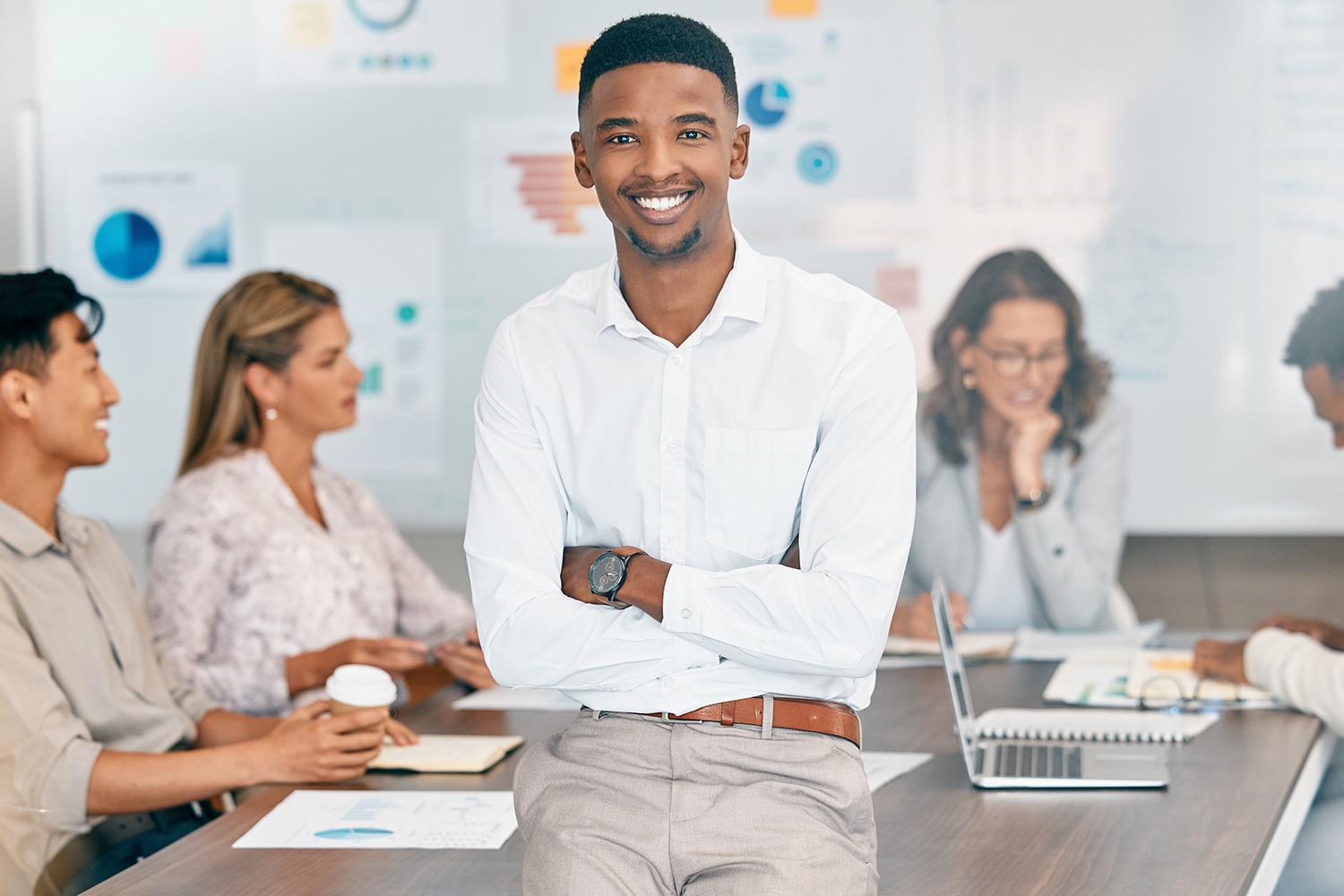 Corporate man, diverse team leader at business meeting, planning and financial strategy in office