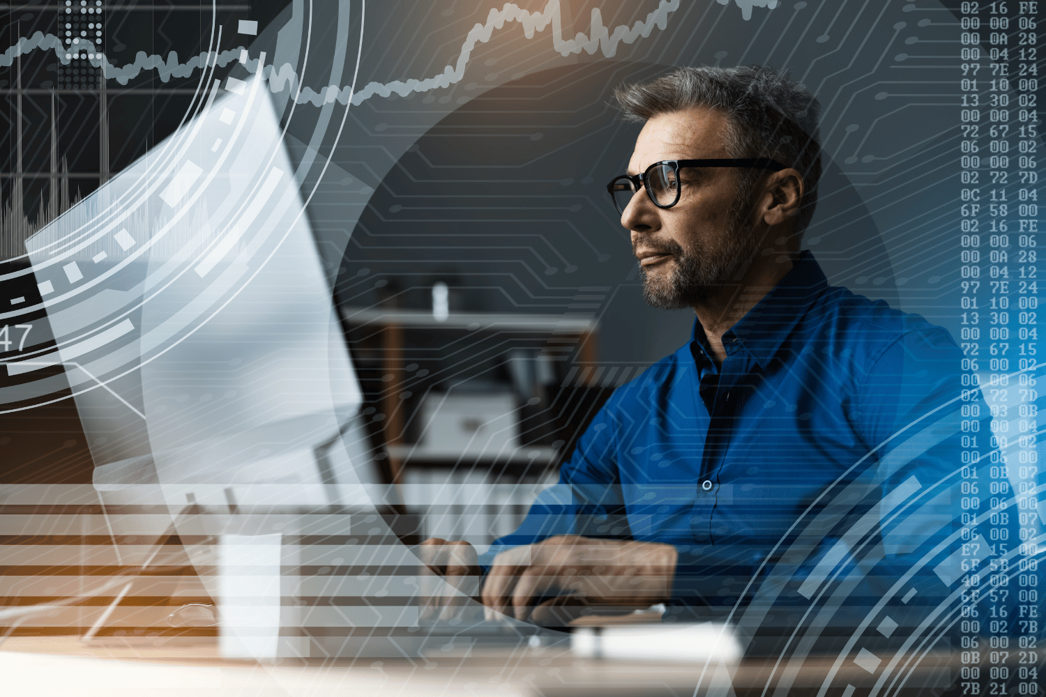 Man working on computer with digital overlay