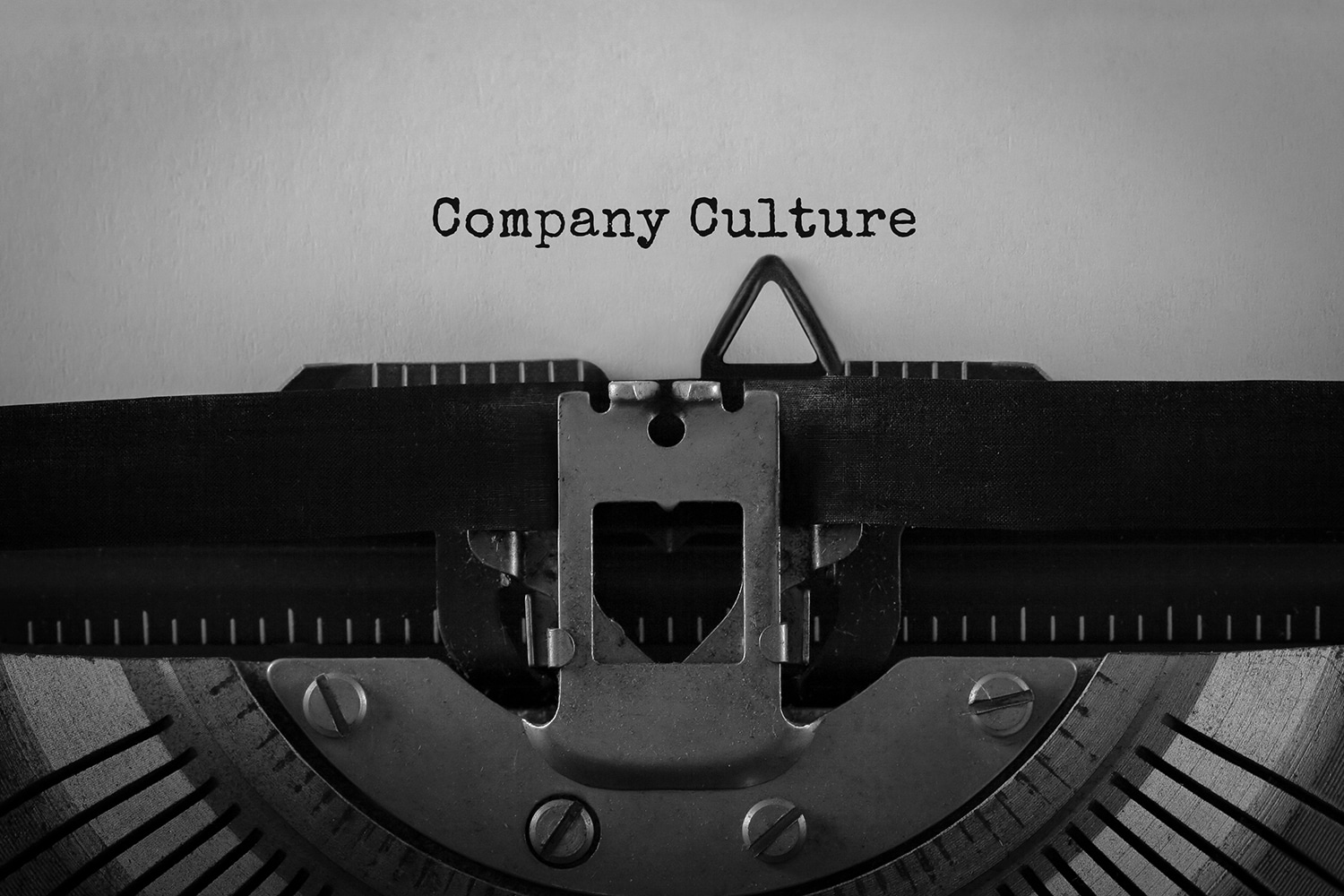old typewriter with the words company culture typed out