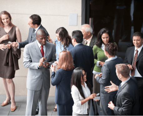 group of professional businesspeople at networking event