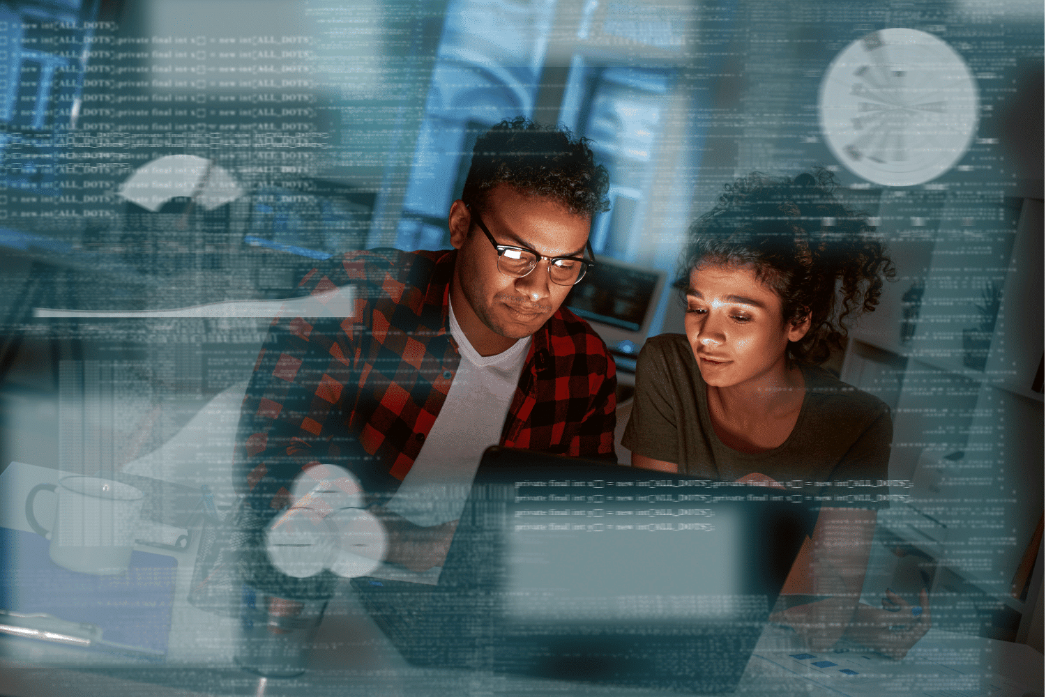 professional man and woman working on computer together with data graphic overlay