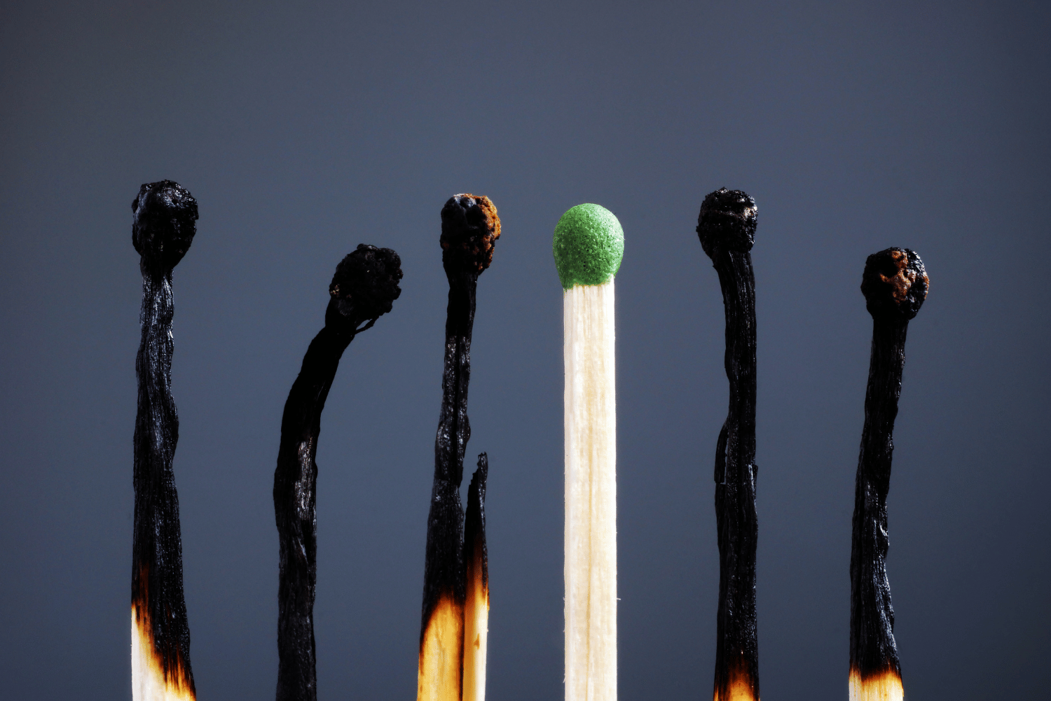 5 burned matchsticks and one unused matchstick