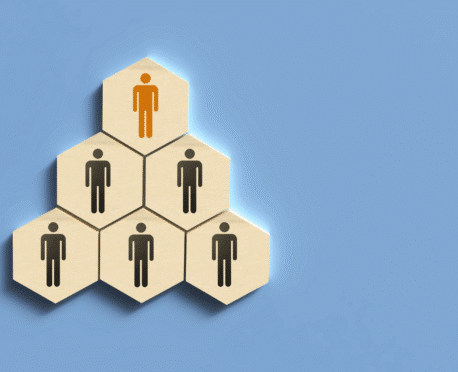 Conceptual graphic of a leadership hierarchy where the top executive is highlighted in orange. This illustrates the result of a strategic partnership between internal HR teams and search firms to identify and integrate the best-fit leadership talent.